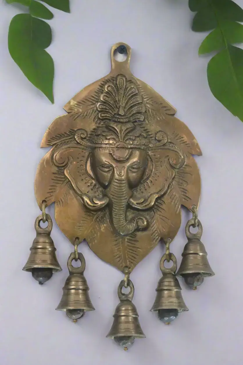 Elegant Brass Ganesha on Leaf With Bells Wall Hanging